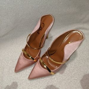 Pink mule style stilettos
